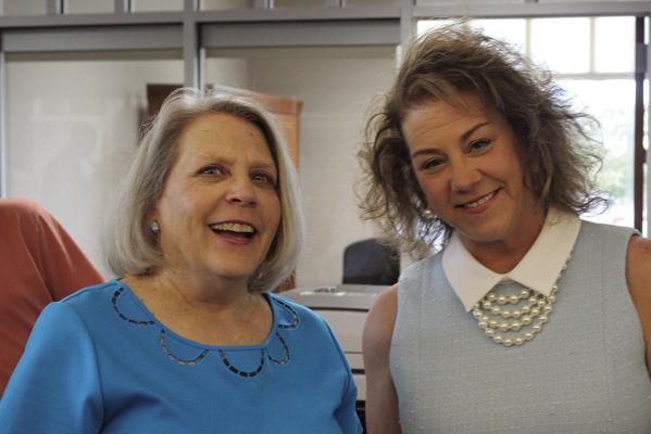 COMMUNITY BANK OF MISSOURI President and COO Stephanie Landwehr (left) welcomes Richmond City Administrator Tonya Willim to the gathering. SHARON DONAT | Staff