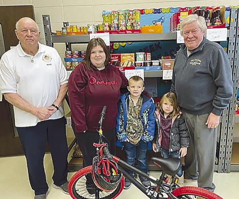 Landyn Lee (center), 6, was the recipient of a brand new bicycle from the GAP Assistance Program of Ray County’s recent raffle. Pictured with Landyn is Don Lake (from left), founder of the GAP program, Landyn’s mom, Jessica Lee, sister Christine, and GAP board member David Miller. DON LAKE | Submitted