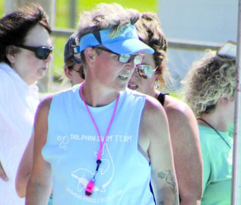 TRISH FIELDS COACHES youth swimmers, a role she took on after her own children joined the team. SHARON DONAT | Staff