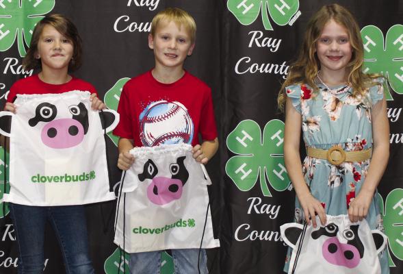 TRU BARHAM (from left) Mike Dolt and Lillianna Opfer receive Clover Kid Award. RAY COUNTY 4-H | Submitted