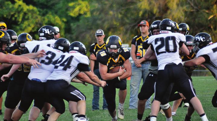 SOPHOMORE RUNNING BACK Jaxon Miller sees a hole in the line during Orrick’s preseason jamboree scrimmage with Norborne Hardin-Central Aug. 20 at Braymer. SHAWN RONEY | Staff