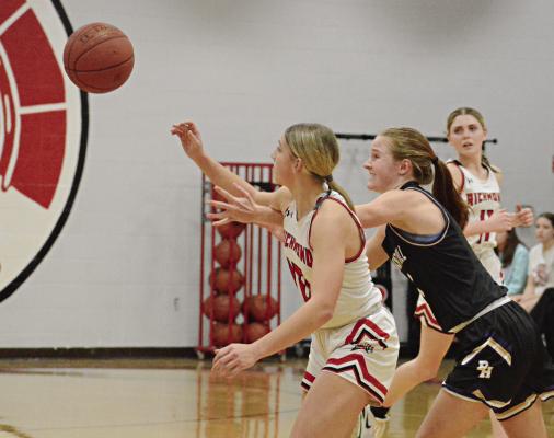 LIKE THE BASKETBALL in this Jan. 4 photo, shown during Richmond’s home varsity girls meeting with Pleasant Hill, Ray County’s prep sports programs have found themselves up in the air, wondering when they’ll face interscholastic competition again because of the latest winter weather. SHAWN RONEY | Staff