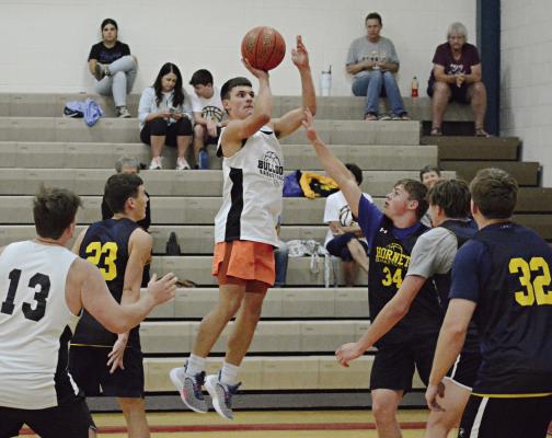 KAMERON PUGH attempts a jump shot during Hardin-Central’s meeting with Penney of Hamilton Monday in summer-league play at Lawson. SHAWN RONEY | Staff
