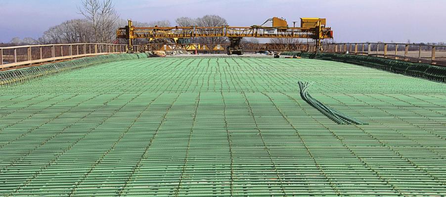 CONCRETE is poured into place on the Route J Bridge in southern Ray County. J.C. VENTIMIGLIA | Staff
