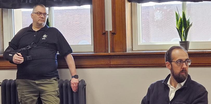 RAY COUNTY SHERIFF’S OFFICE Sergeant David Francken (left) and Victory Technology Owner Evan Allen review equipment costs, installation details and monitoring access during a discussion about proposed camera systems for county facilities. MIRANDA JAMISON | Staff