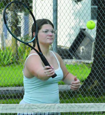 AVA BOZARTH works on her net play while preparing for her final season of Richmond High School tennis. SHAWN RONEY | Staff