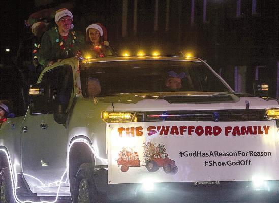 GRAND MARSHAL REASON SWAFFORD and family travels the parade route. SHARON DONAT | Staff