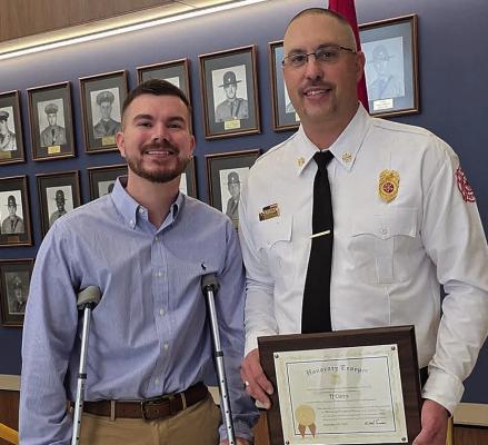 HIGHWAY PATROL CORPORAL Zach Thomas (left) meets Wood Heights Fire Chief T.J. Curry, who was recognized for aiding him at an October crash scene. Submitted
