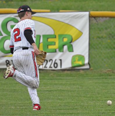 IN ADDITION to providing one of the two hits for Richmond during the Spartans’ loss to Lafayette County of Higginsville, junior Lochlan Steele runs down this ball that’s hit deep into the outfield. SHAWN RONEY | Staff