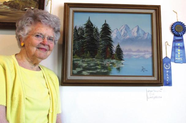 JUNE HARRISON’S landscape painting “Lonely Winter” takes first place as the best oil painting and the Judge’s Choice Award for best overall submission. J.C. VENTIMIGLIA | Staff