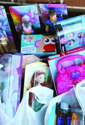 Richmond middle and high school girls’ basketball collected nearly 20 bags of toys at their toy drive on Sunday Dec. 18.