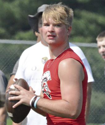 JACOB LIEBERKNECHT looks downfield as he takes reps at quarterback for Richmond. The Spartans concluded a series of Tuesday morning 7-on-7 sessions this week, hosted by Kearney High School. Like Richmond’s other prep sports programs, the football program enters a dead period Saturday.