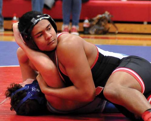 RICHMOND SOPHOMORE Hayden Happy keeps his head up as he maintains control of Brookfield’s Maksim Kerr during the Spartans’ championshp dual Dec. 11 at the Tom Hayes Dual Tournament in Lexington. The Spartans finish second, based on a tiebreaker with Brookfield.