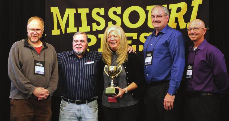 THE 2021 Missouri Press Association Gold Cup Sweepstakes Award goes to the Richmond News for the third year in a row. The award is received Sept. 25 at The Elms Hotel and Spa during the association’s annual three-day convention. From left are Sports Editor Shawn Roney, Editor-in-Chief Jack “Miles” Ventimiglia, association President Liz Irwin, Publisher Brian Rice and sportswriter Dustin Danner. PATRICIA M. VENTIMIGLIA