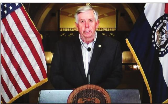 GOV. MIKE PARSON gives a coronavirus update at the Capitol in Jefferson City on March 27.