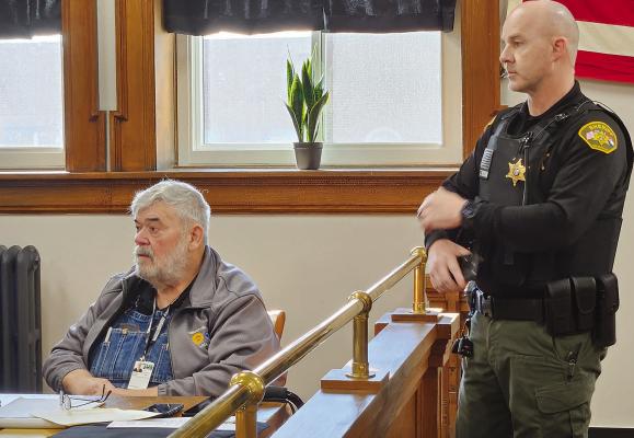 EMERGENCY MANAGEMENT official Kenneth Kenyon (left) and Ray County Sheriff’s Office Major Tom Noon discuss Red Cross shelter certification for the Eagleton Center. MIRANDA JAMISON | Staff