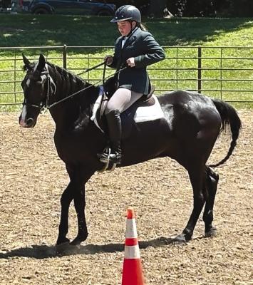 REAGAN ALLEN brings her horse Fred to a trot. JOSHUA BRUNGARDT | Staff