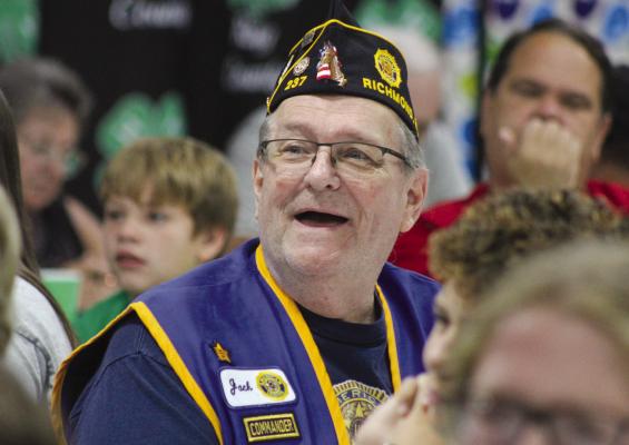 AMERICAN LEGION Commander Jack Lauck bids on Richmond High School FFA senior Taylor McGothlin’s 18-pound cured ham at $35/lb. SOPHIA BALES | Staff