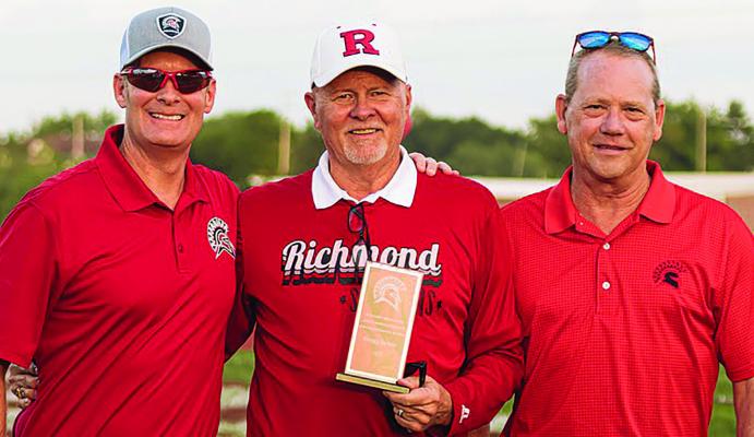 GREGG STEELE (center) is recognized for decades of contributions to Richmond athletic programs. Submitted