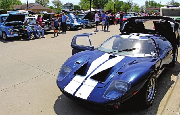 VINTAGE and modern vehicles drive guests to the car show during the 40th Annual Richmond Mushroom Festival in the municipal center parking lot. J.C. VENTIMIGLIA | Staff