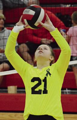 SENIOR ALLISON COATS practices her setting before Richmond’s Oct. 12 varsity match with visiting Carrollton.