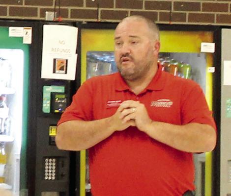 RICHMOND HIGH SCHOOL Principal Brandon Quick shares slide show with board of education. SHARON DONAT | Staff