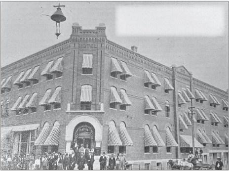 The first carbon lights of Richmond sway gently in the breeze. This one was suspended by wires from the buildings on the four corners and was lowered daily by the “lamp tender” to have the carbon replaced. Submitted