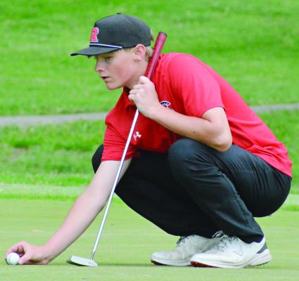 RICHMOND SOPHOMORE Isaac Kaylor marks his ball during the Class 3 District 4 Tournament. SHAWN RONEY | Staff