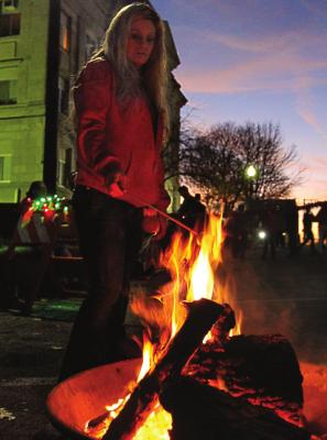 FIRST BAPTIST provides fire pits, sticks and marshmallows, and Andrea Demboski is among many people who join in the roast.