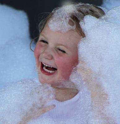 MCKINLEE NEWTON is immersed in bubble fun.