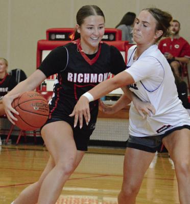 RICHMOND VARSITY girls basketball coach Kaylee Vantrump expects Adilyn Swope (left) to be the Spartans’ floor general this season. SHAWN RONEY | Staff