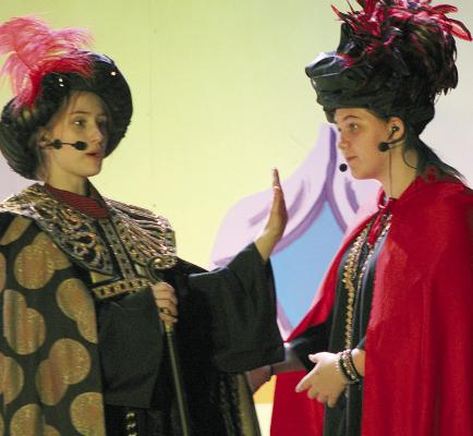 KAMERON POKEY (left) and Elaine Borchert perform together on stage before the opening night of Aladdin. SHARON DONAT | Staff