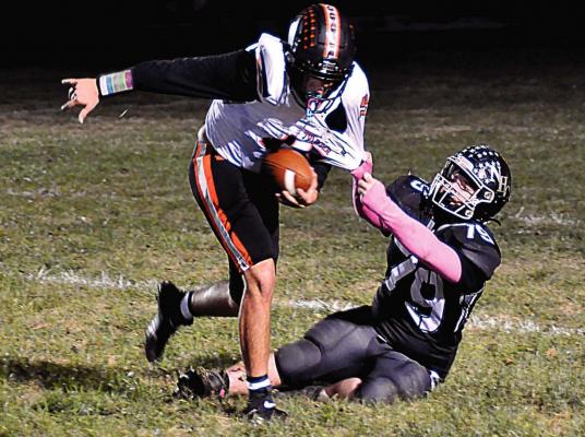 J.W. DOYLE makes a tackle for Norborne Hardin-Central to help the Aggies thump Keytesville/Northwestern of Mendon Oct. 23 at Norborne and ensure NHC will finish above .500 this season. SHAWN RONEY | Staff