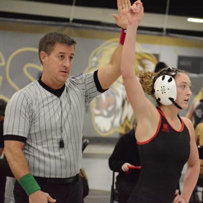IZZY JENKINS (right), a Richmond sophomore, is declared the winner of her match with Excelsior Springs’ Makayla Maring at the Excelsior Springs High School Girls Tournament. SHAWN RONEY | Staff