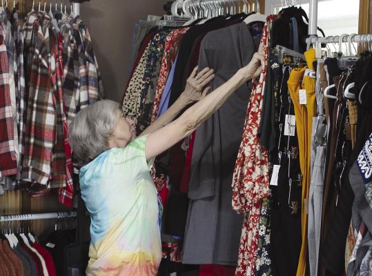 ROSA CLOYD shops for clothes at Marie’s Closet for her upcoming trip to New York.