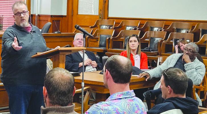 CHAD JUDD (left), a 2018 graduate of the Ray County Adult Drug Court, shares his story of relapse, recovery and gratitude during the program’s 39th graduation ceremony. MIRANDA JAMISON | Staff