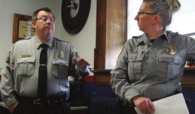 UNDERSHERIFF Steve Mendoza says putting the issue on the ballot lets the public decide whether or not to support building a new jail. Capt. Andraya Kreiling, right, holds a copy of the jail tax ballot language. J.C. VENTIMIGLIA | Staff