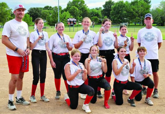 Young softballers win tourney; cap perfect season