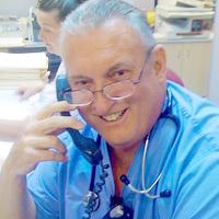 John Edward Scowley, M.D.