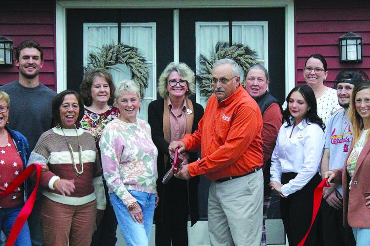 RICHMOND AREA CHAMBER of Commerce members join Red Barn Farm staff for a ribbon-cutting event in celebration of the business opening. SHARON DONAT | Staff