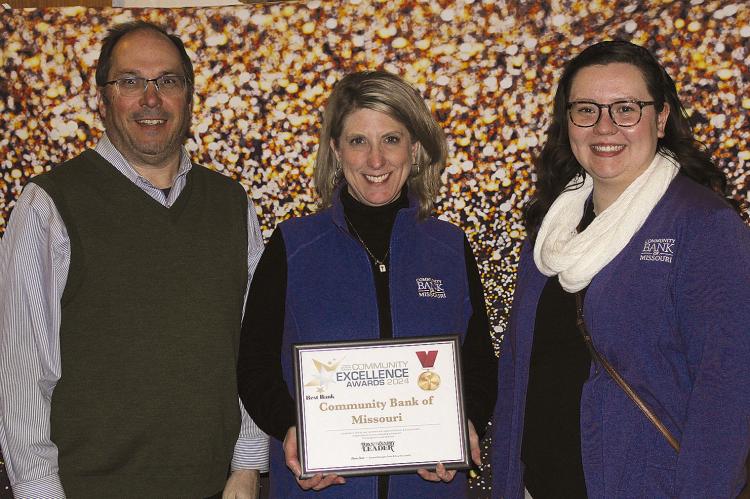 COMMUNITY BANK OF MISSOURI Executive Vice President Brad Hogan (from left), Senior Vice President Amy Deitch and Compliance Officer Courtanie Woods receive the award for Best Bank. MIRANDA JAMISON | Staff