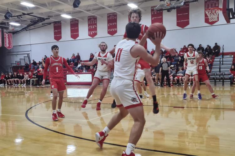 SENIOR DAYNE LOFTIN looks to pass.