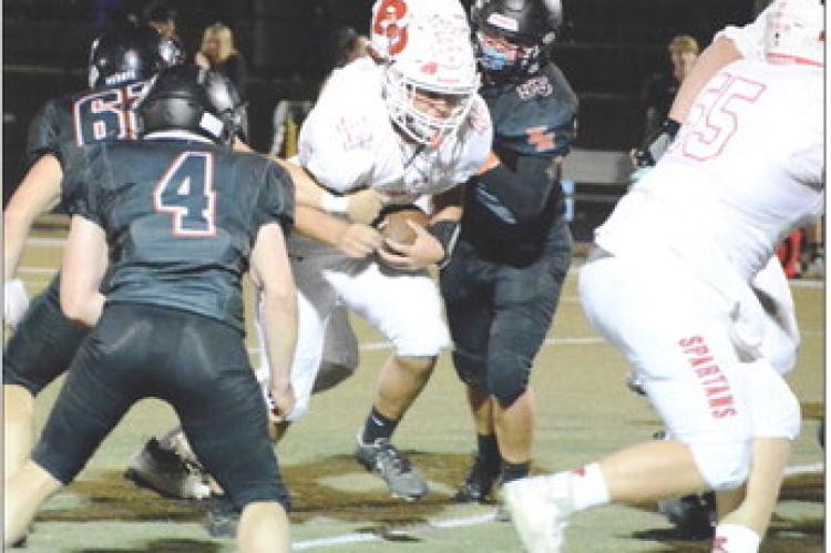 RICHMOND SOPHOMORE Dayton Bushong, No. 44, rumbles through a hole in the line during the second half of the Spartans’ 48-0 Oct. 14 road rout of Knob Noster in Missouri River Valley Conference East Division action. SHAWN RONEY | Staff