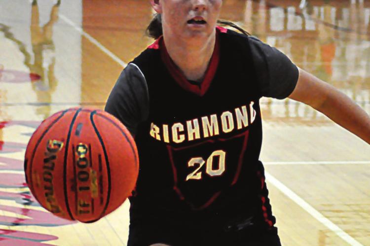 JUNIOR TRINIDY FISK attempts to control the ball during a November practice in the RHS gym. SHAWN RONEY | Staff