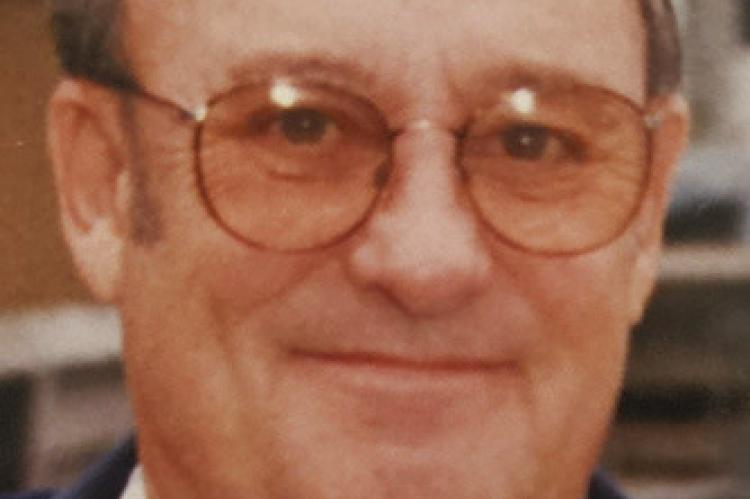 JAMES D. DOWNS