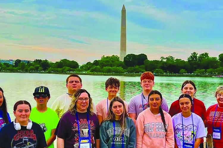 STUDENTS FROM RICHMOND, MO., and Independence, Kan., middle schools visit the Washington Monument during a four-day educational trip to the nation’s capital. Submitted
