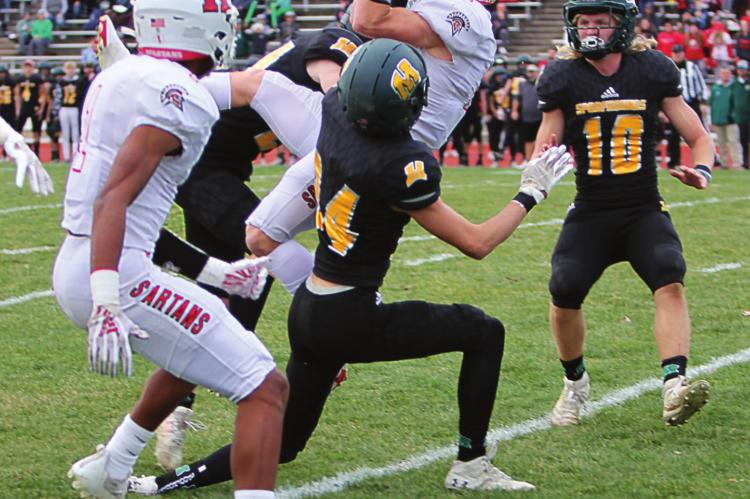 J.C. VENTIMIGLIA | Staff wideout Layne Cavanah at the 12-yard line. Cavanah goes up in traffic and comes down with the reception.