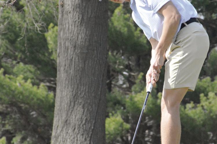 MATTOX McCLOUD, shown attempting a putt during practice, is among four returning varsity players that Richmond boys golf coach Brandon Rittmiller expects to help lead the program this spring. SHAWN RONEY | Staff