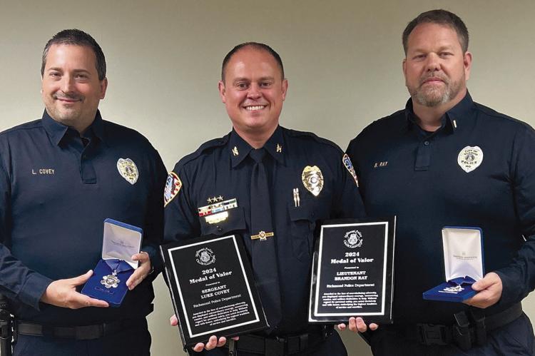 RICHMOND POLICE DEPARTMENT Sgt. Luke Covey (from left), Chief Scott Bagley and Lt. Brandon Ray celebrate receiving the Medal of Valor. Submitted