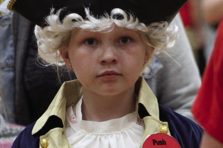 KORI FORBIS plays George Washington as a wax figurine.
